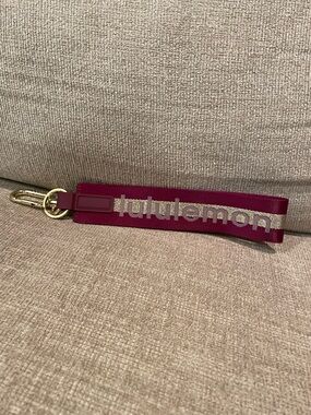 lululemon athletica Magenta Wristlet with Gold Hardware